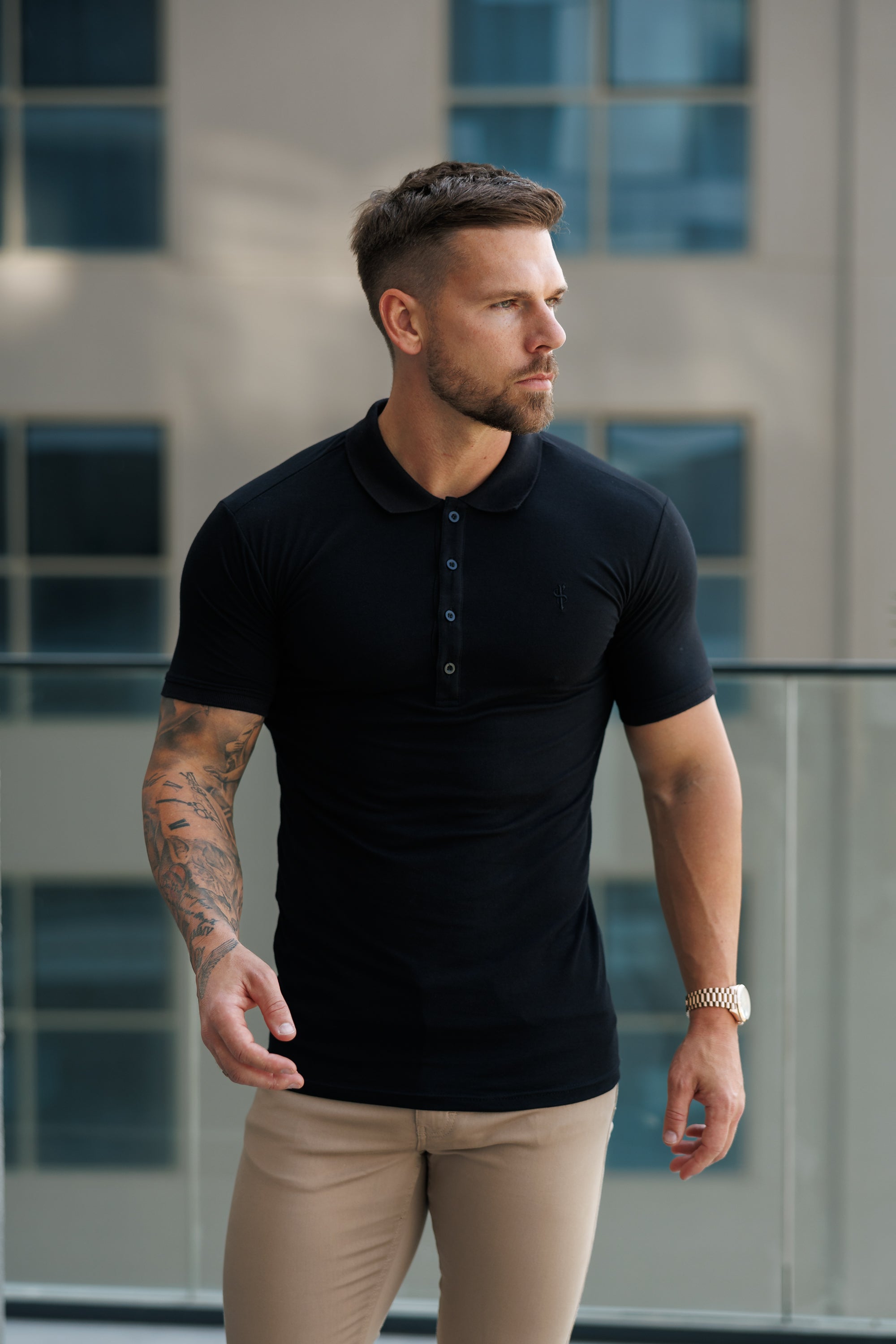 Classic Black Polo Shirt with Tonal Button and Embroidery