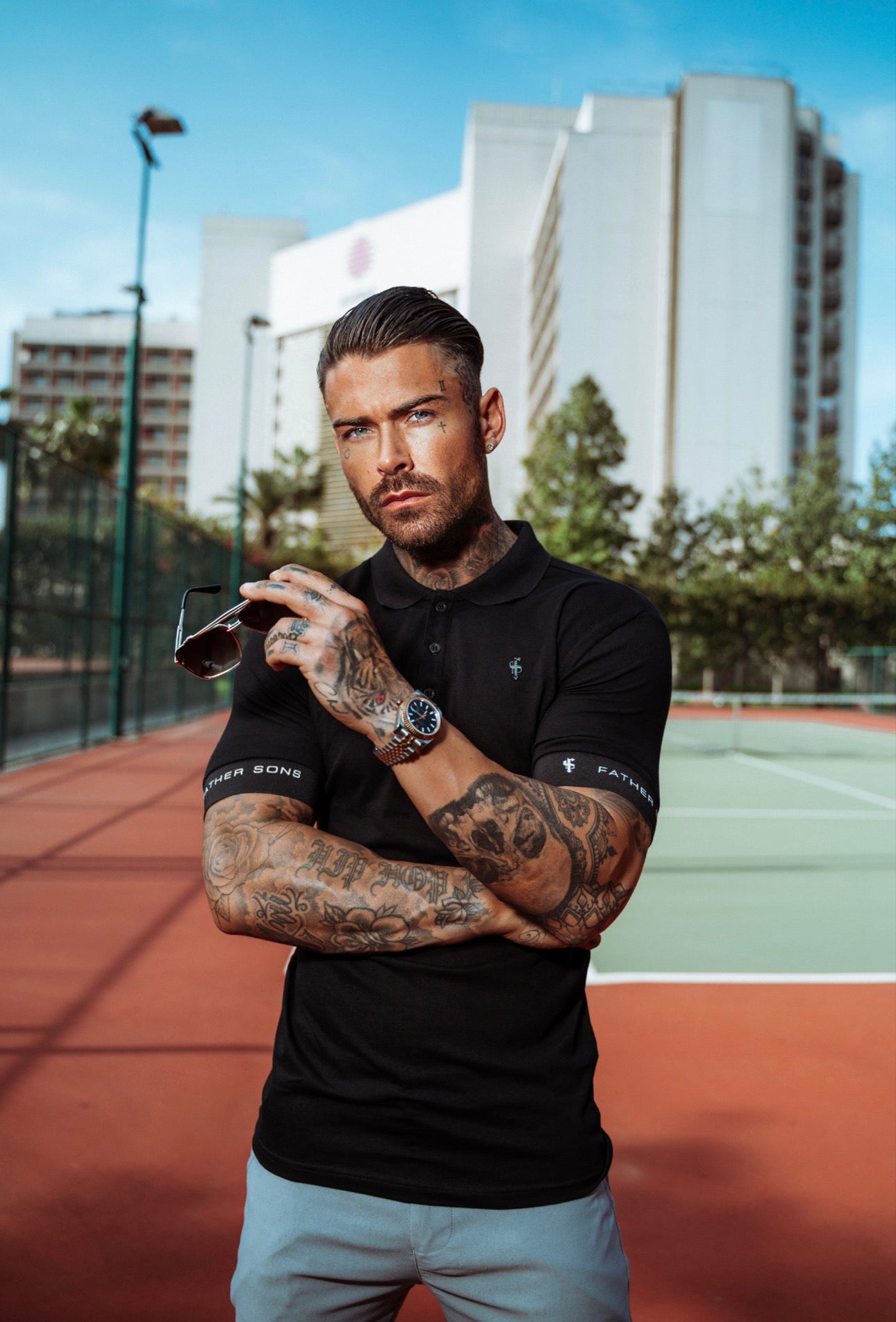 Classic Black Polo with FS Elastic Sleeve Branding and Black Metal Emblem - FSH631