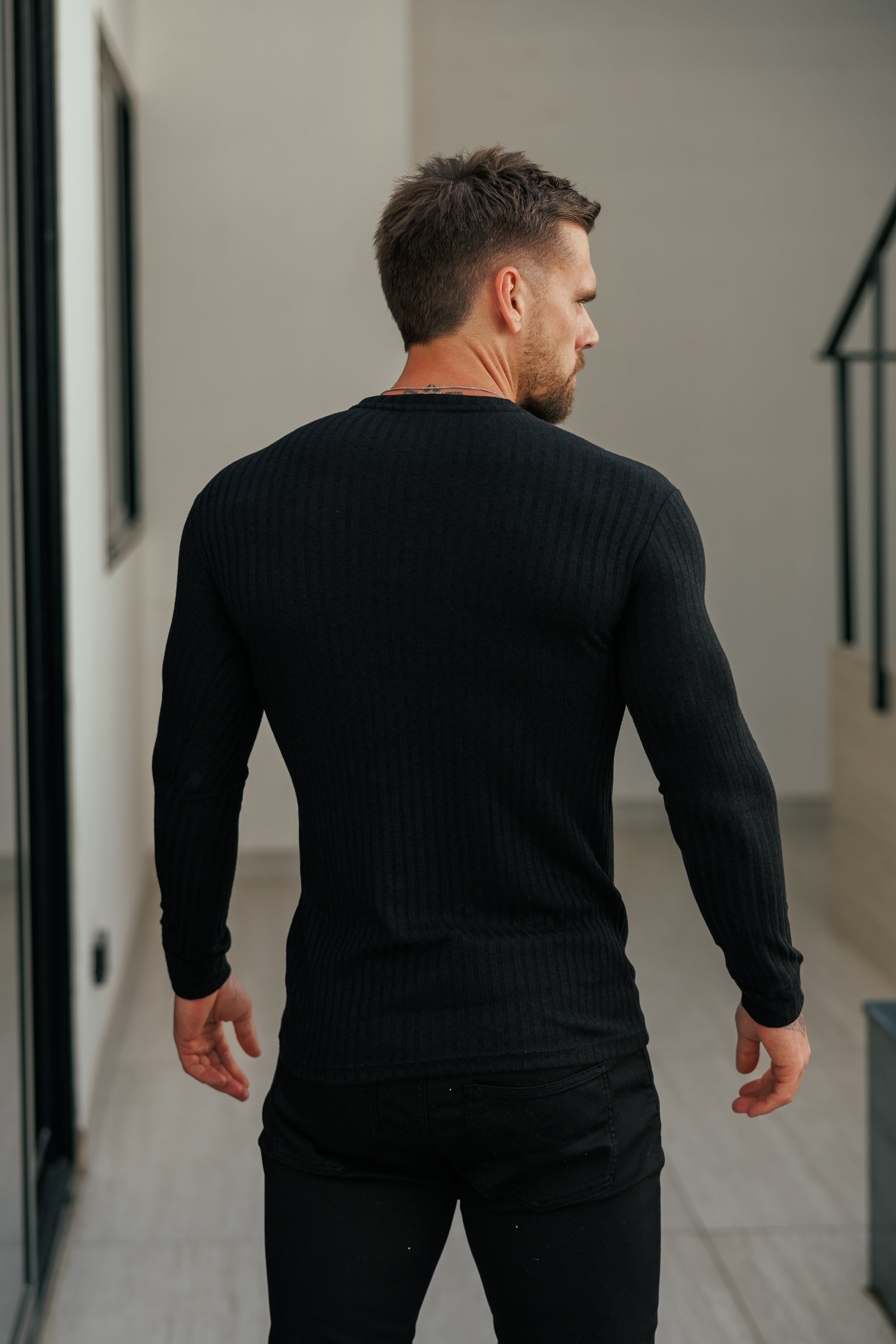 Super Slim Black Ribbed Knit Jumper With Black Metal Emblem - FSH1443