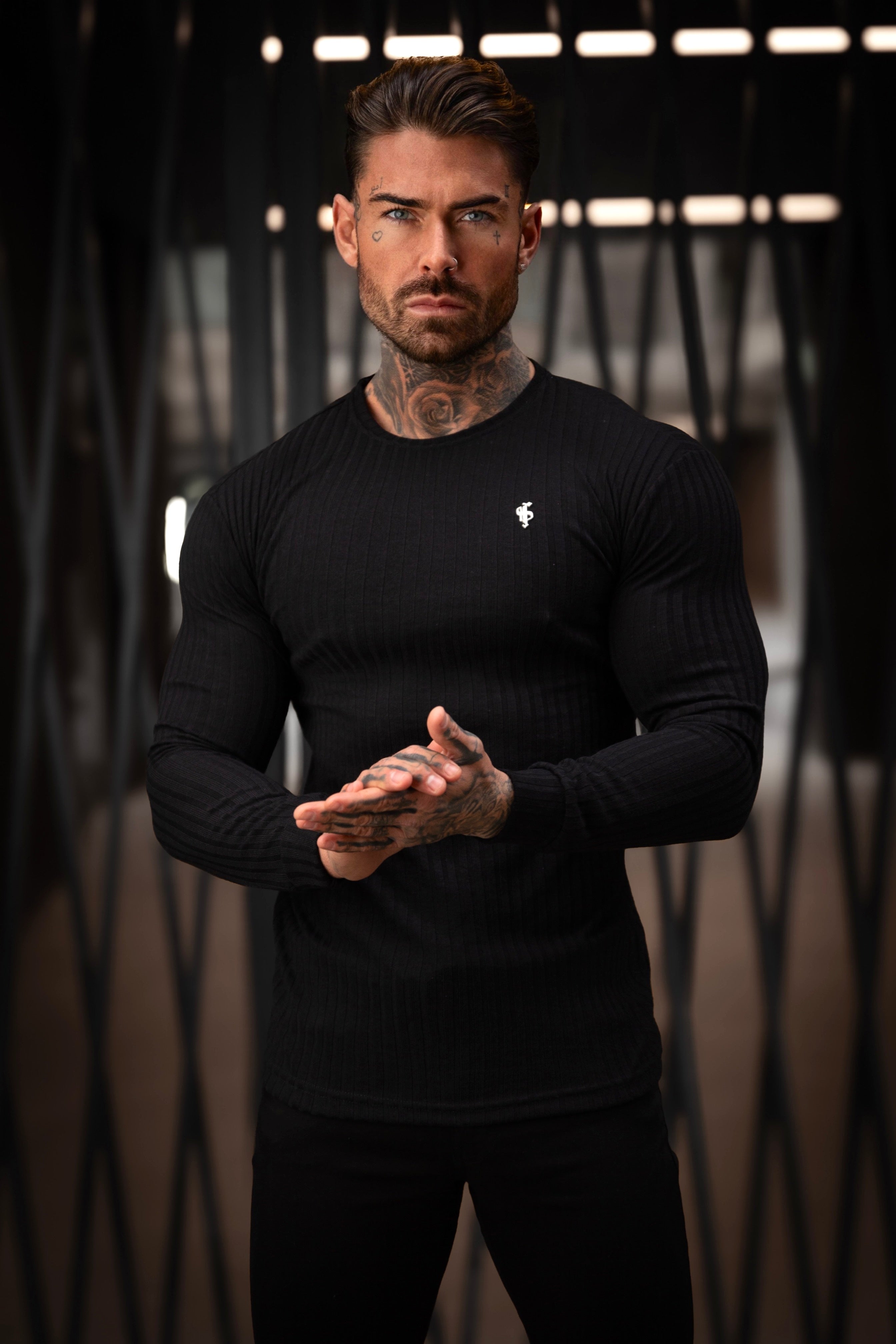 Super Slim Ribbed Knit Jumper With Silver Metal Emblem