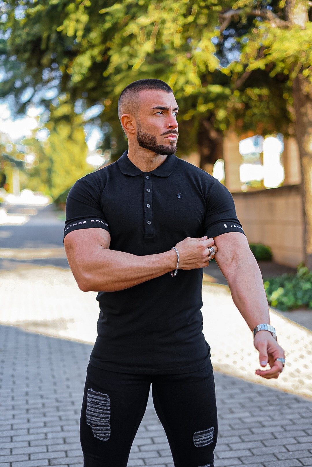 Classic Black Polo with FS Elastic Sleeve Branding and Black Metal Emblem - FSH631