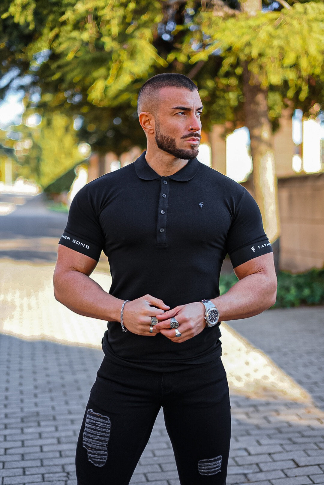 Classic Black Polo with FS Elastic Sleeve Branding and Black Metal Emblem - FSH631